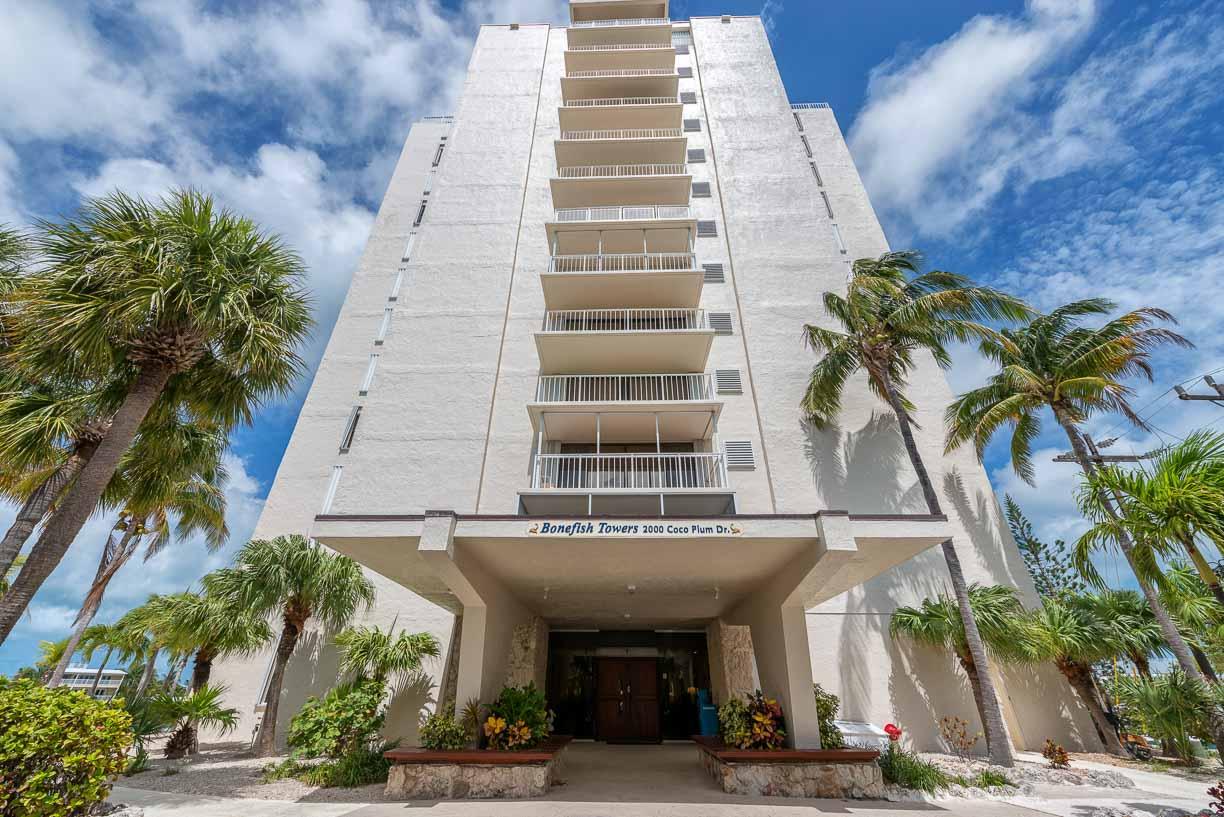 2000 Coco Plum Drive, Unit 404 Marathon, FL 33050 - Photo 2 of 23 a front view of a building