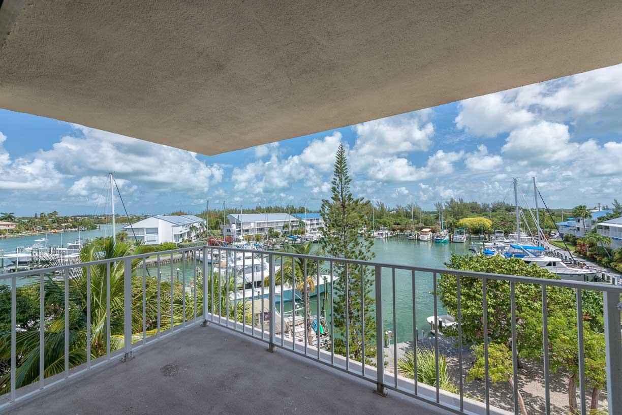 2000 Coco Plum Drive, Unit 404 Marathon, FL 33050 - Photo 6 of 23 a view of a balcony