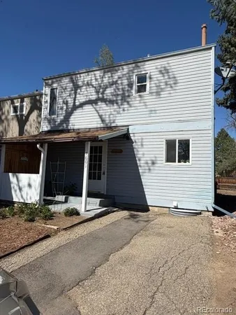a view of a house with a garage