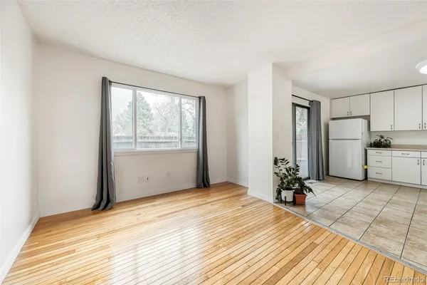 a room with a bed and a window