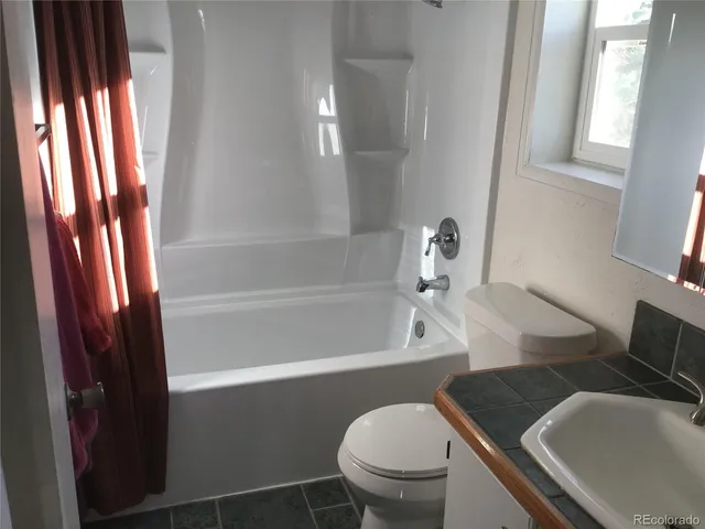 a bathroom with a sink and a tub