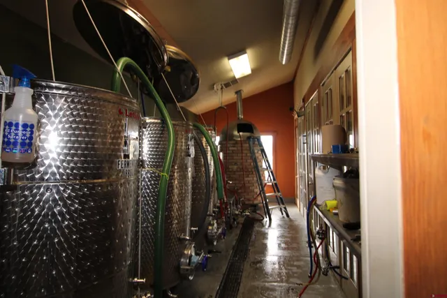 a view of a swimming pool with a table and chairs