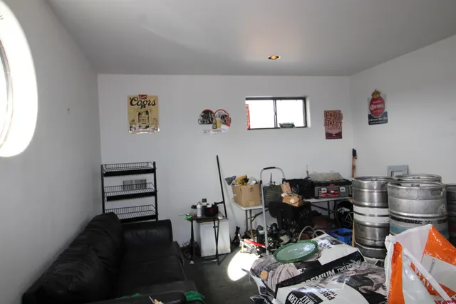 a store room with lots of different colored cloths