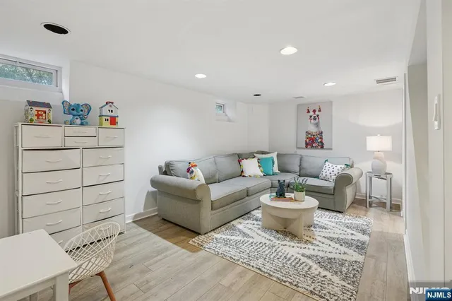 a living room with furniture and a table