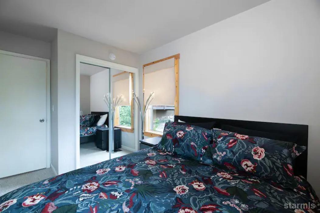 115 Tramway Drive, Unit 1 Stateline, NV 89449 - Photo 16 of 20 a bed room with a bed and a window