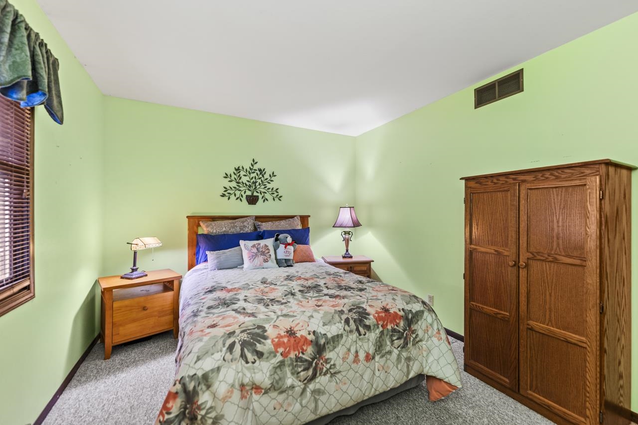 295 Forestcliff Court Lake Summerset, IL 61019 - Photo 15 of 30 a bedroom with a bed and a window