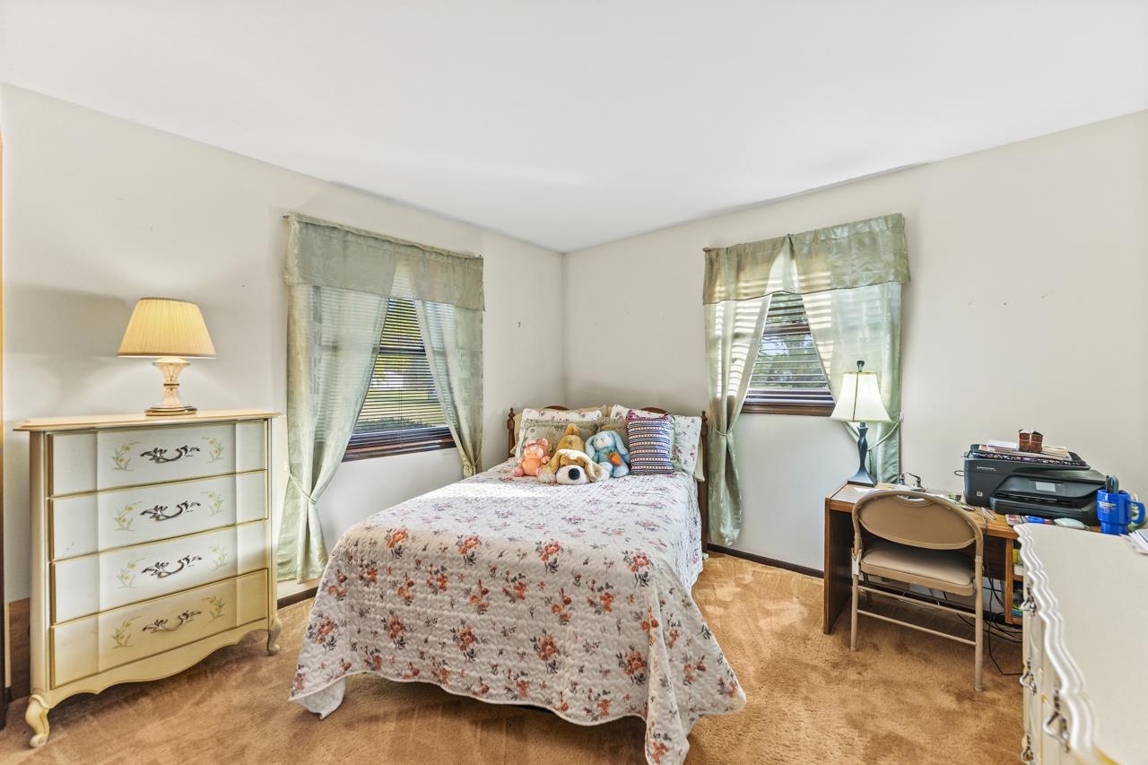 295 Forestcliff Court Lake Summerset, IL 61019 - Photo 18 of 30 a bedroom with a bed and a window