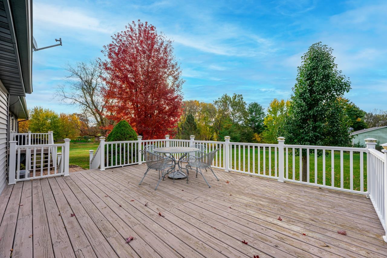 295 Forestcliff Court Lake Summerset, IL 61019 - Photo 24 of 30 a view of balcony with deck and outdoor seating