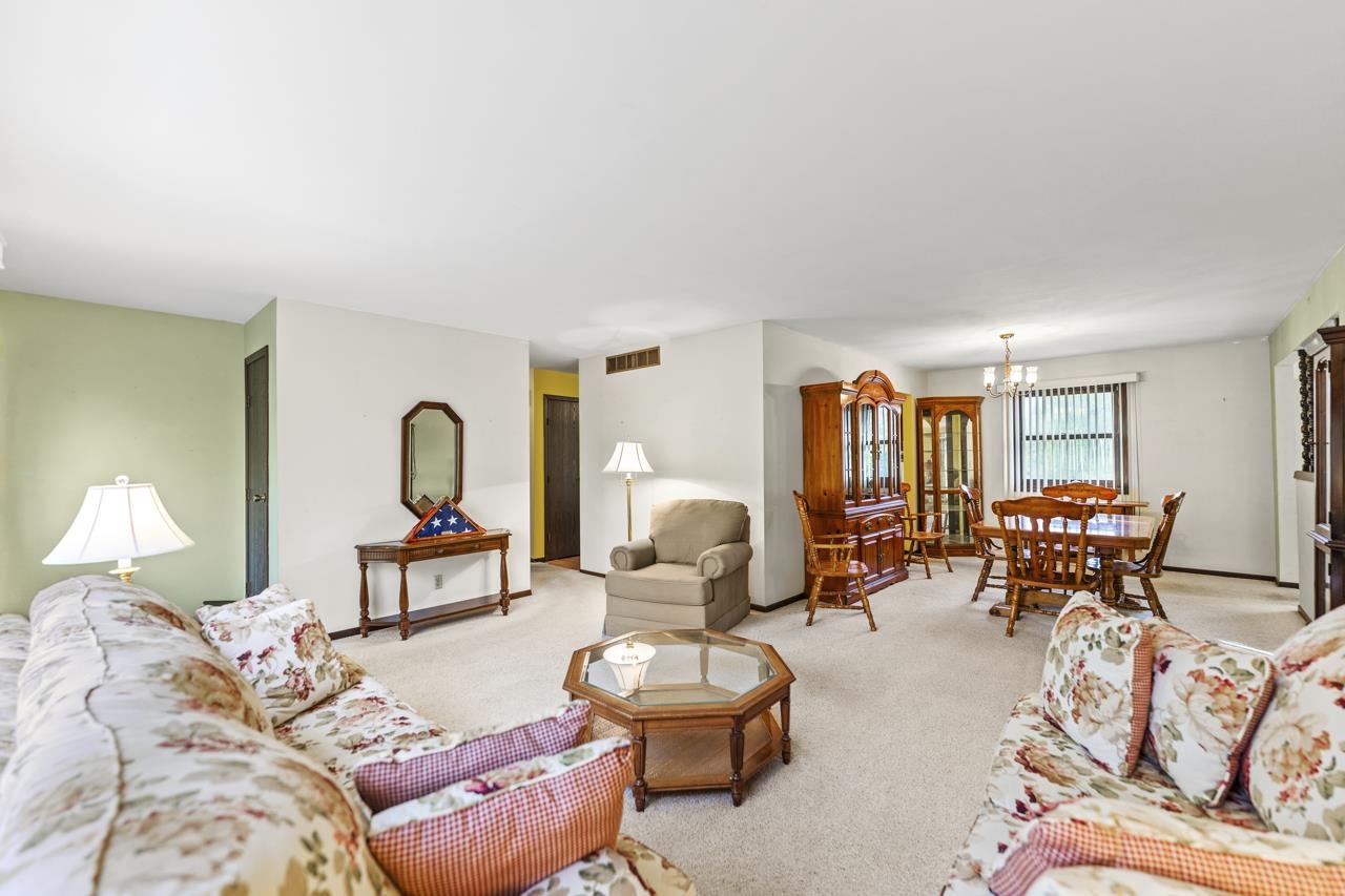 295 Forestcliff Court Lake Summerset, IL 61019 - Photo 5 of 30 a living room with furniture and a large window