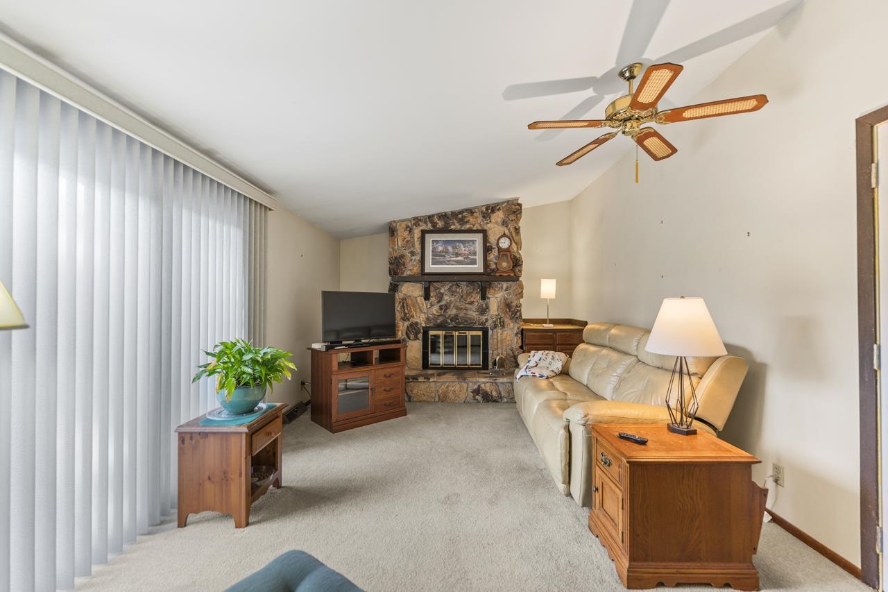 295 Forestcliff Court Lake Summerset, IL 61019 - Photo 8 of 30 a living room with furniture and a potted plant