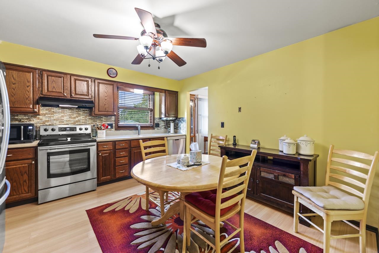 295 Forestcliff Court Lake Summerset, IL 61019 - Photo 10 of 30 a view of a dining room with furniture and a kitchen