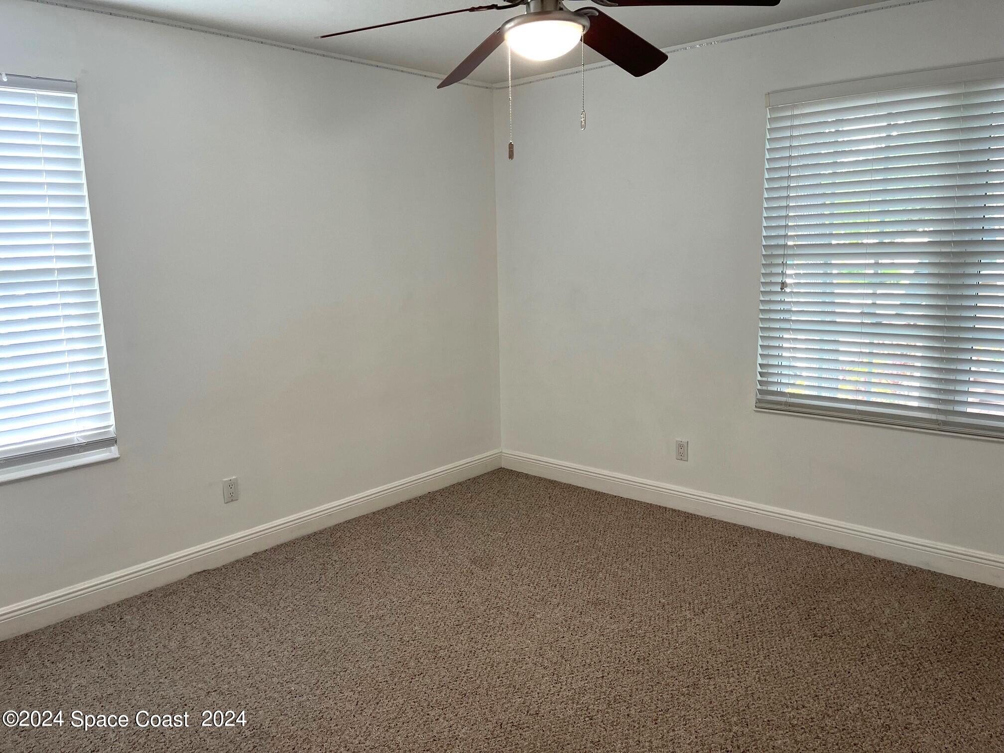 7667 North Wickham Road, Unit 1010 Melbourne, FL 32940 - Photo 14 of 25 3rd Bedroom