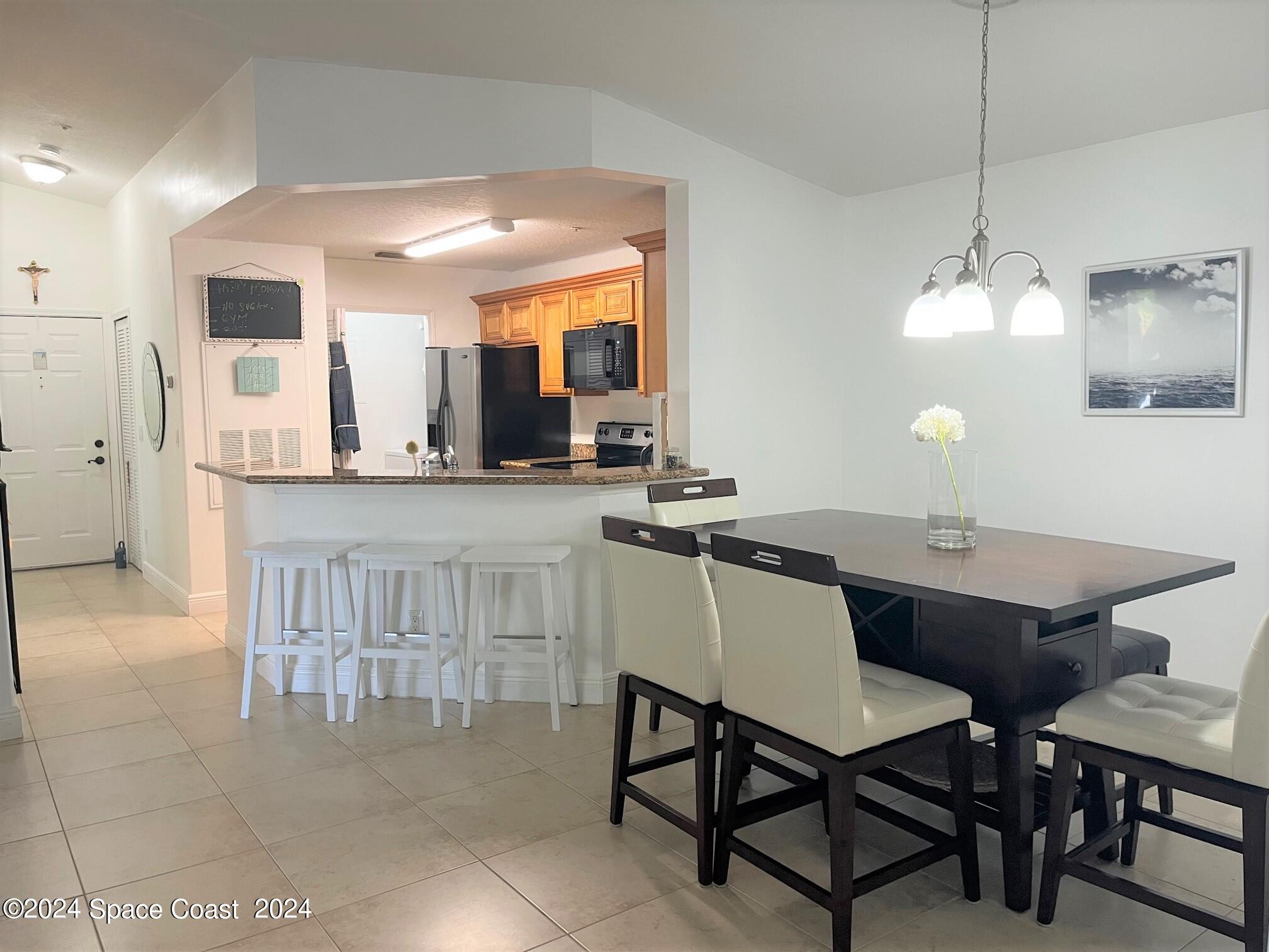 7667 North Wickham Road, Unit 1010 Melbourne, FL 32940 - Photo 15 of 25 Dining Room