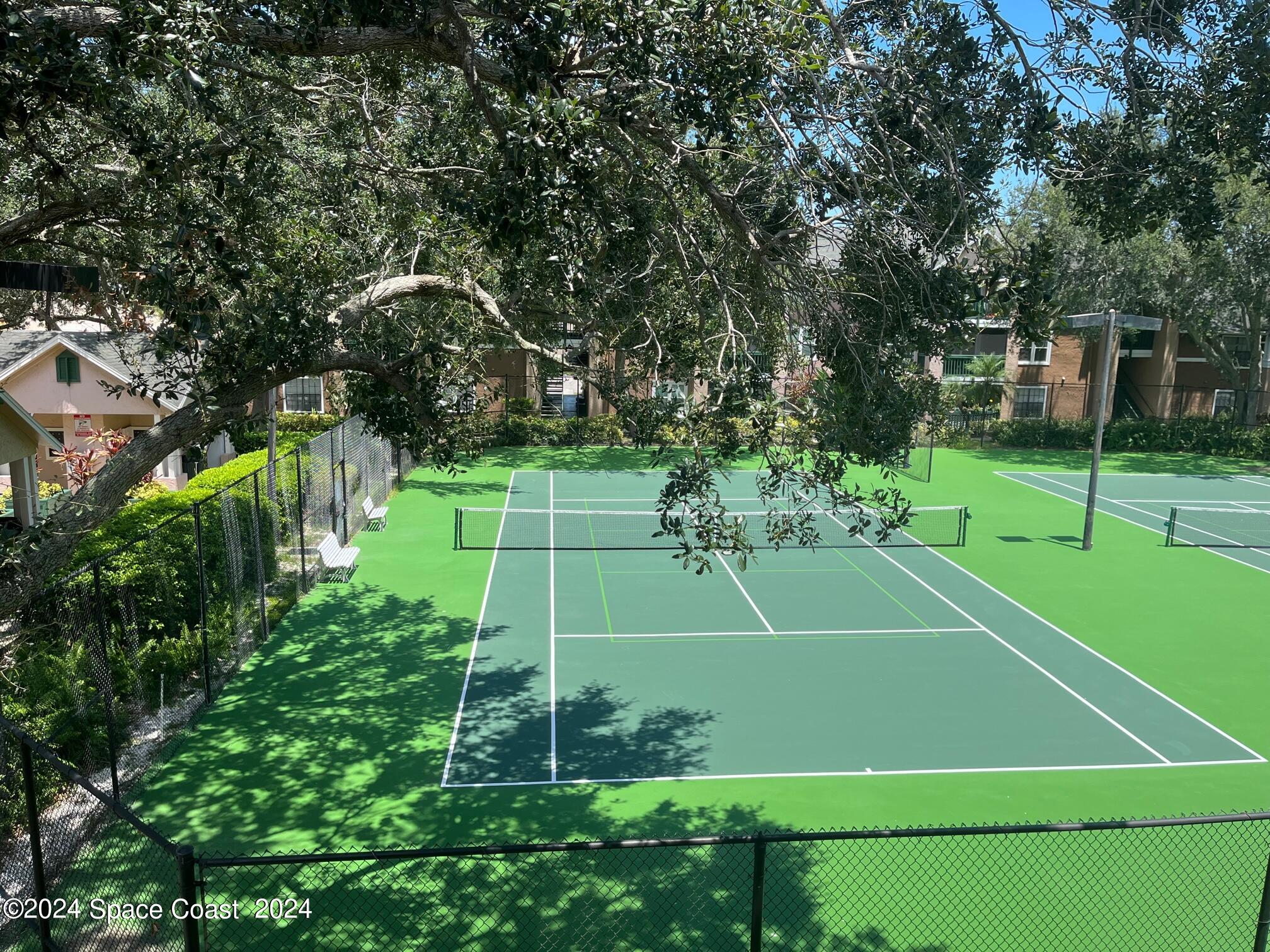 7667 North Wickham Road, Unit 1010 Melbourne, FL 32940 - Photo 20 of 25 View of Tennis Court