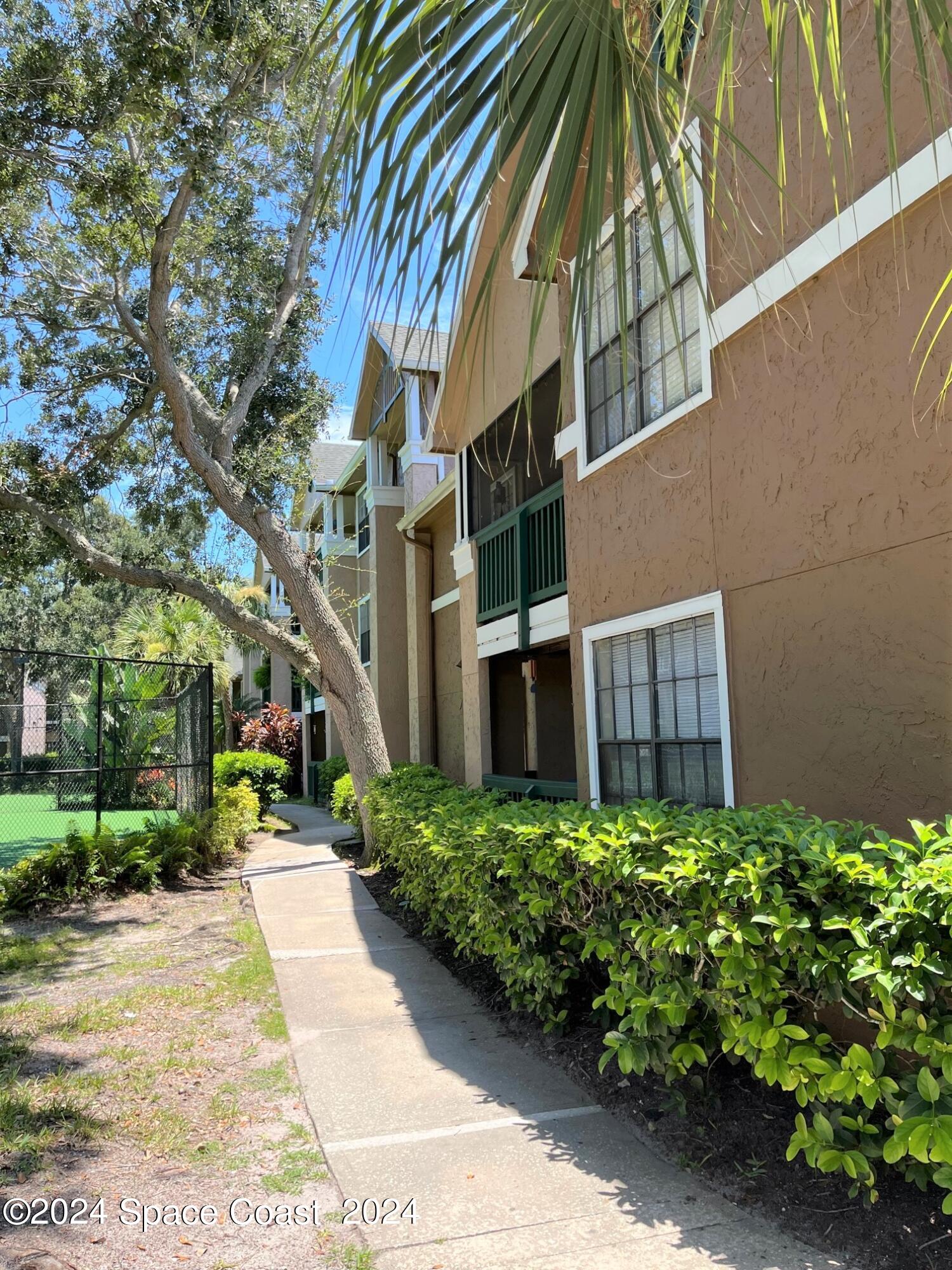7667 North Wickham Road, Unit 1010 Melbourne, FL 32940 - Photo 4 of 25 Sidewalk