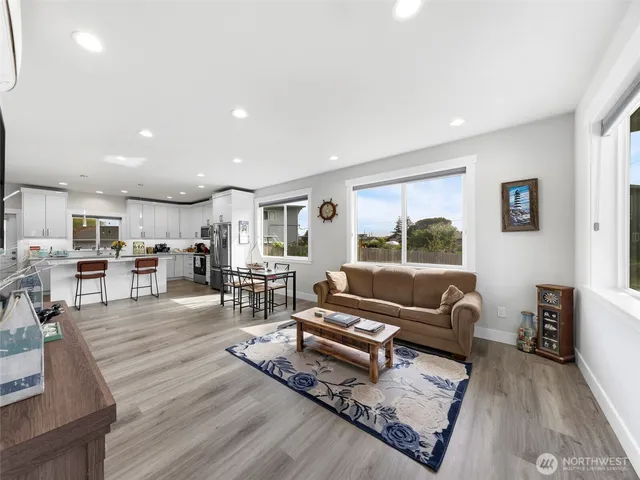 a living room with furniture and a table