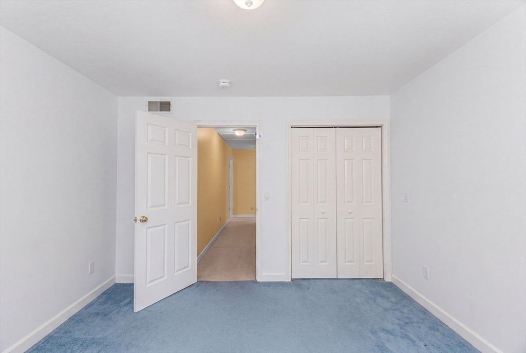 113 Greenwich Plains Road Ware, MA 01082 - Photo 26 of 42 an empty room with closet area