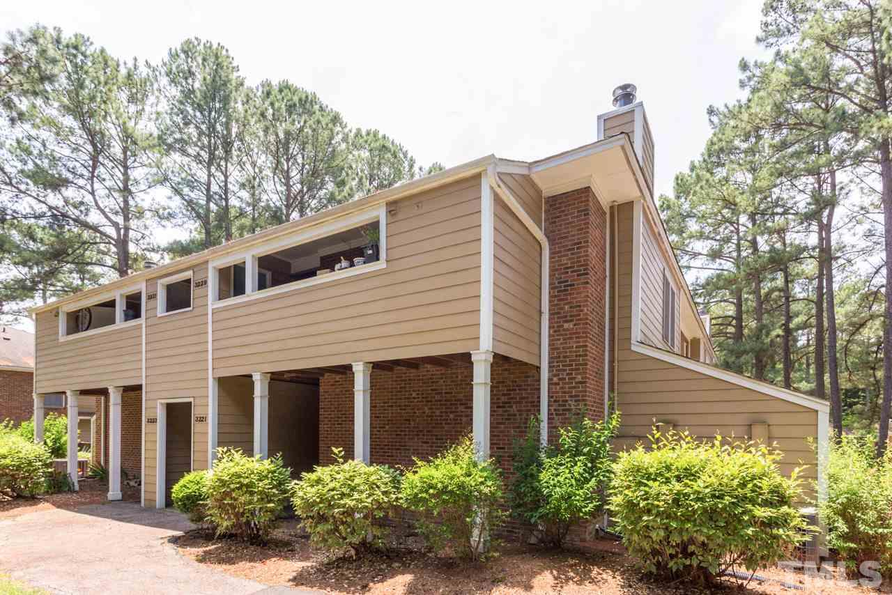 3221 Mill Run Raleigh, NC 27612 - Photo 20 of 20 a view of a house with a yard