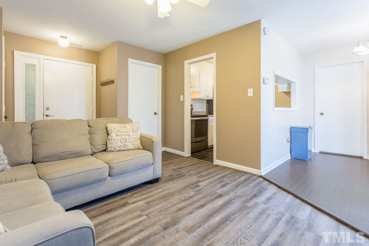 3221 Mill Run Raleigh, NC 27612 - Photo 7 of 20 a living room with couches and painted walls