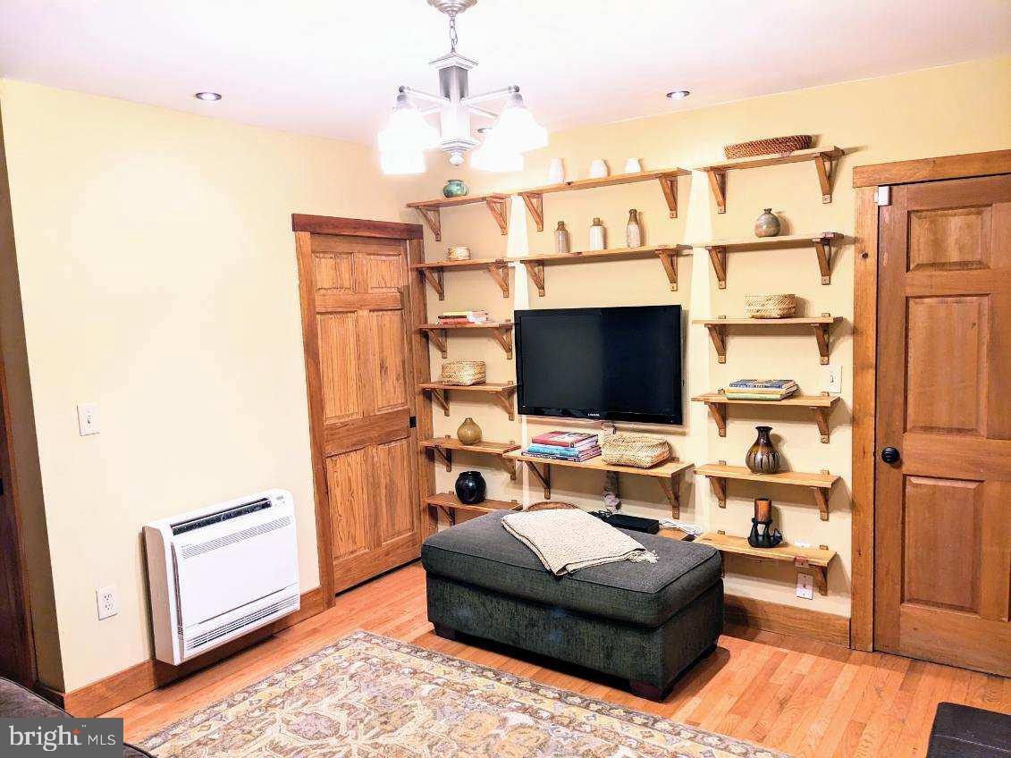 24 Blue Ridge Road Titusville, NJ 08560 - Photo 13 of 34 Family Room with built in shelves and mini split