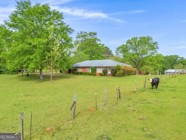 a view of an outdoor space and a yard