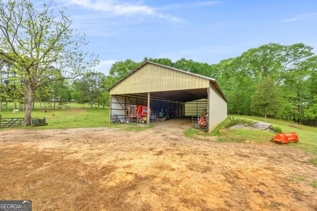 a view of backyard with green space