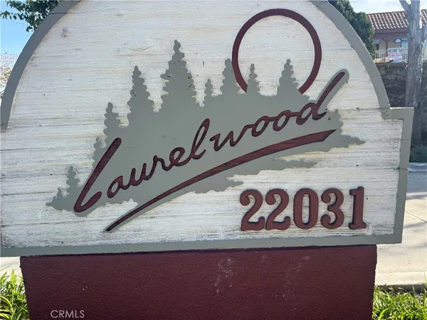 a close up of a sign that is on a wall