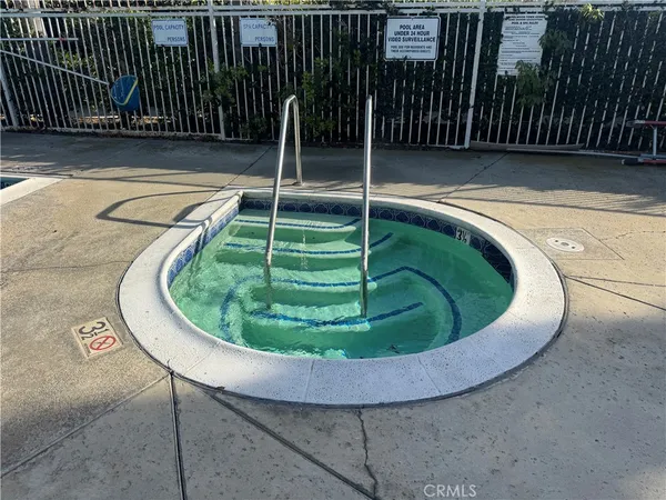 a view of a swimming pool with a sink