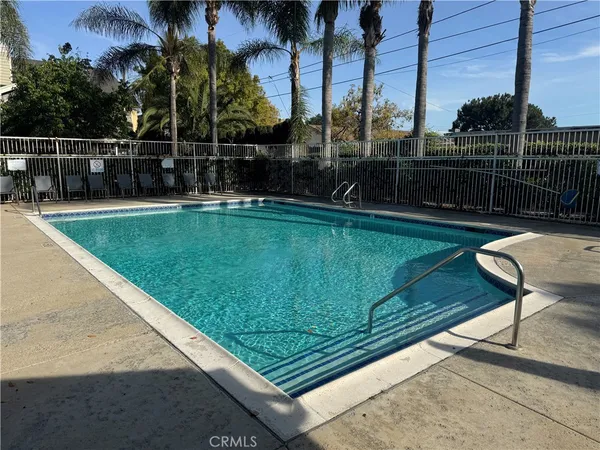 a view of a backyard with a sitting area