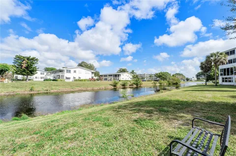 a view of a lake with houses
