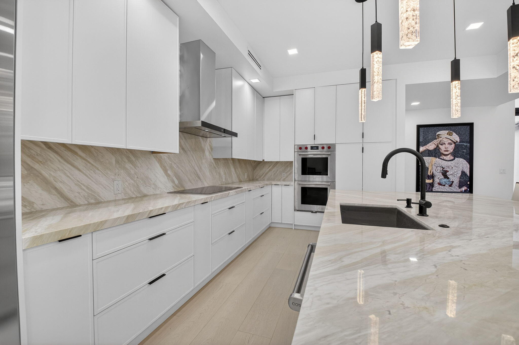 5723 Hamilton Way Boca Raton, FL 33496 - Photo 22 of 111 a kitchen with stainless steel appliances kitchen island sink a refrigerator and cabinets