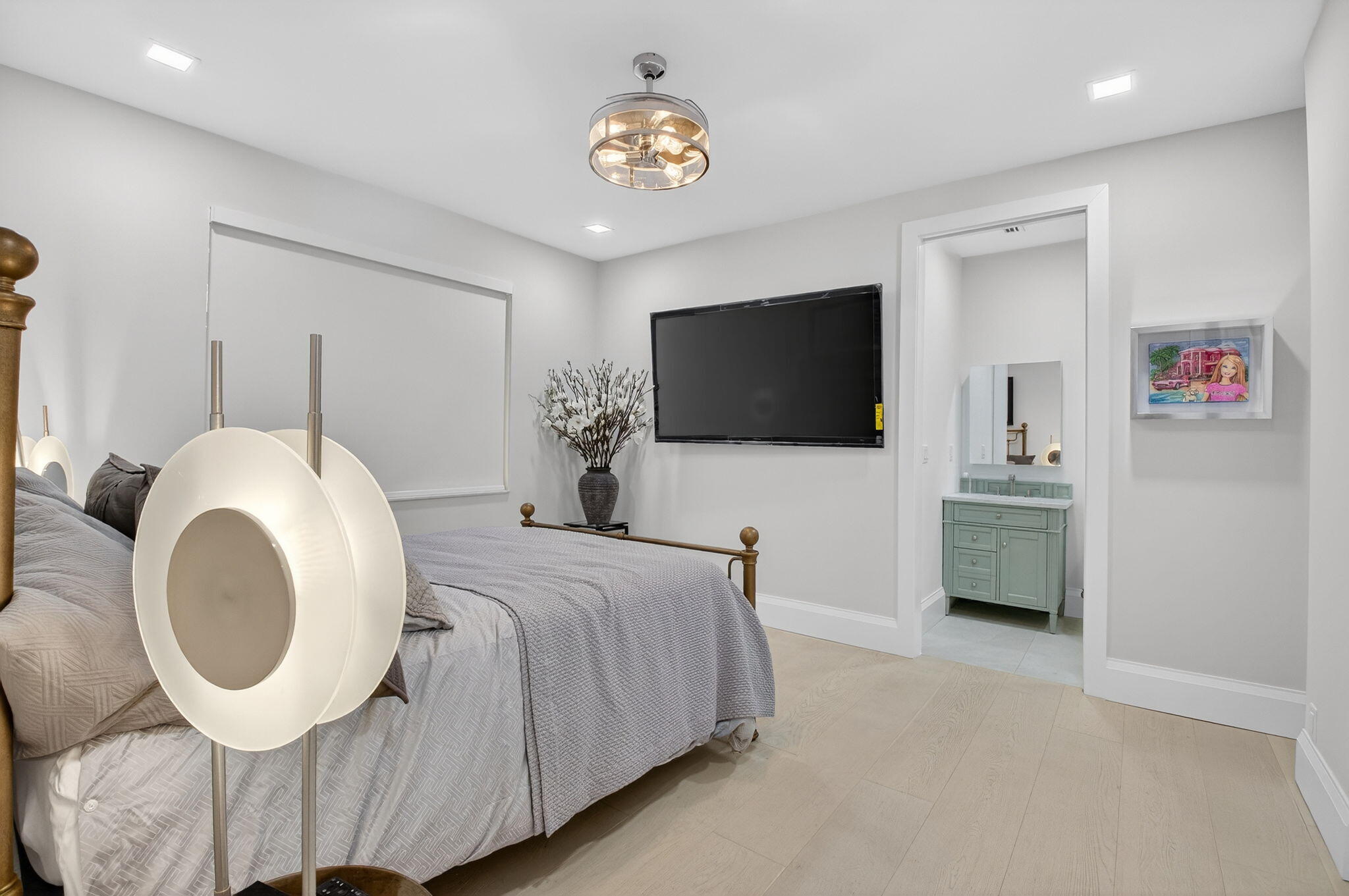 5723 Hamilton Way Boca Raton, FL 33496 - Photo 32 of 111 a spacious bedroom with a bed and a flat screen tv