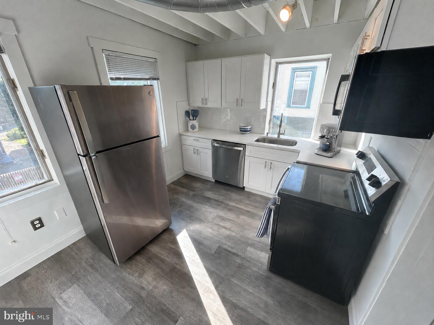 874 B County Line Road, Unit 1 Bryn Mawr, PA 19010 - Photo 1 of 7 Modern kitchen with sleek finishes.