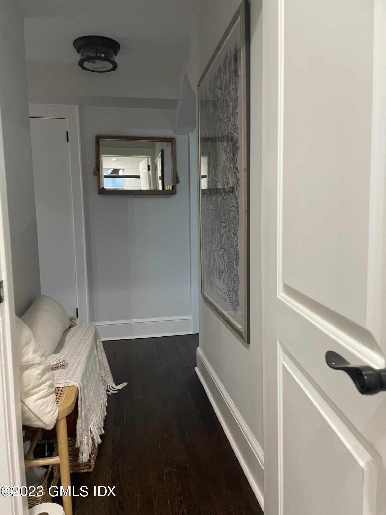 60 Weaver Street, Unit 2 Greenwich, CT 06831 - Photo 16 of 20 a bathroom with a sink and a mirror