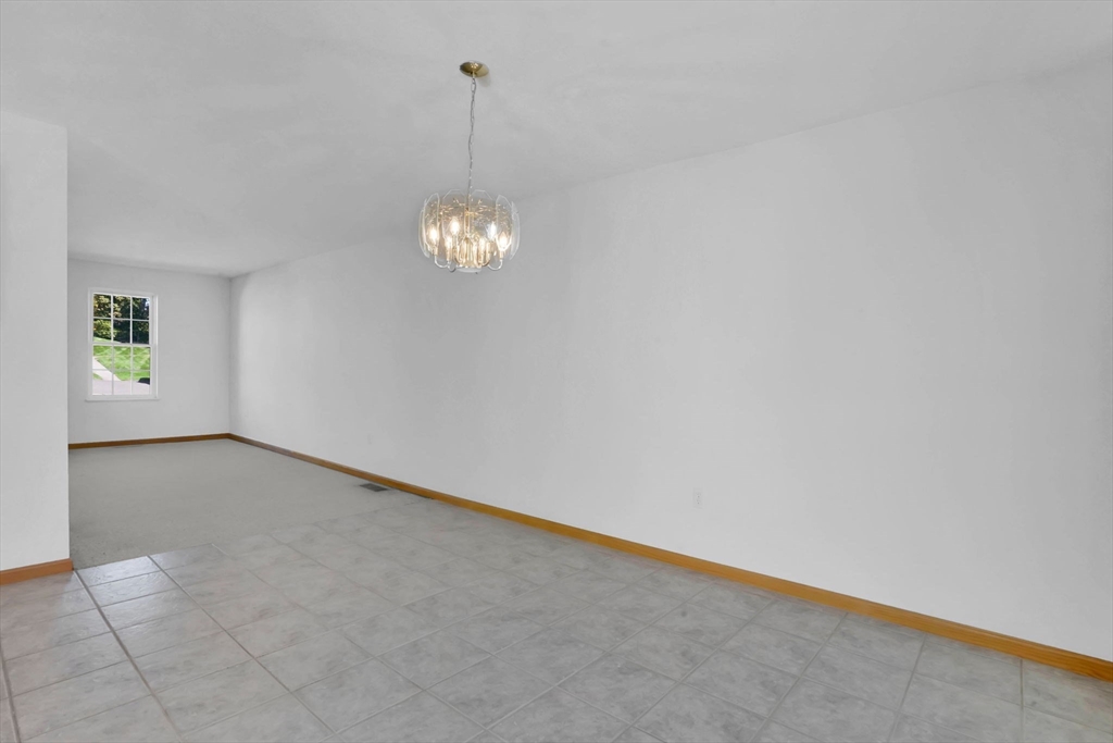 665 Center Street, Unit 705 Ludlow, MA 01056 - Photo 12 of 35 a view of an empty room with a window