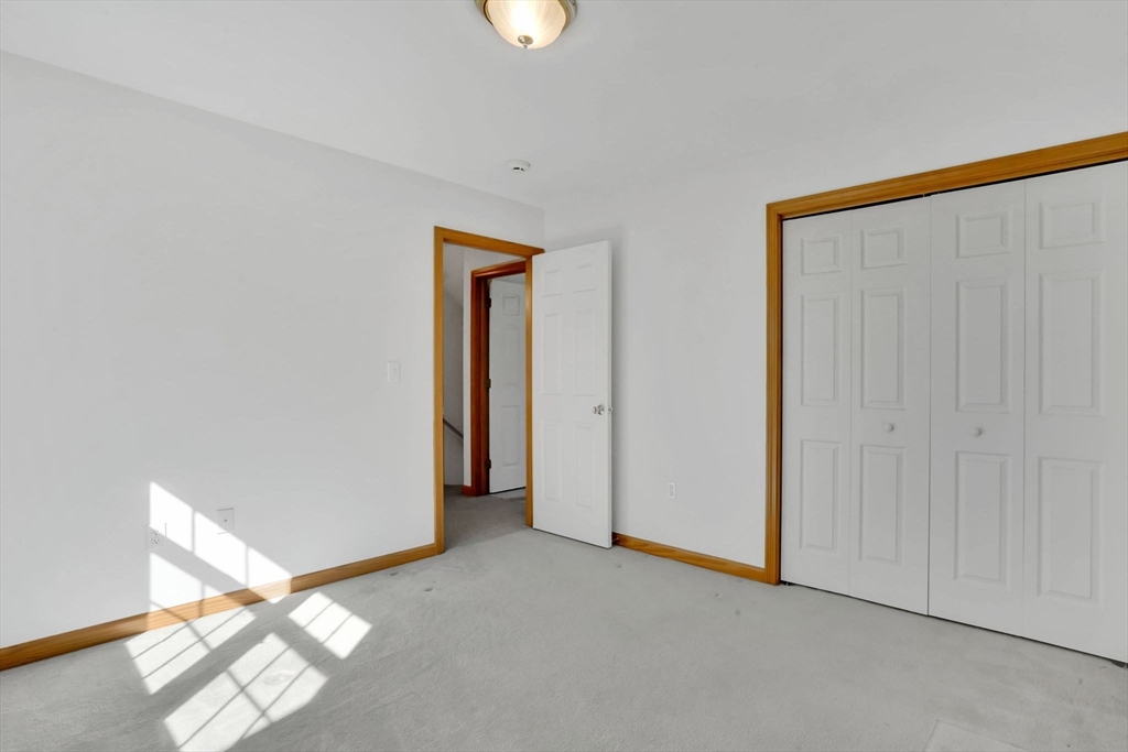 665 Center Street, Unit 705 Ludlow, MA 01056 - Photo 22 of 35 a view of entryway with stairs