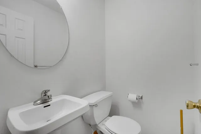 a bathroom with a sink and a toilet