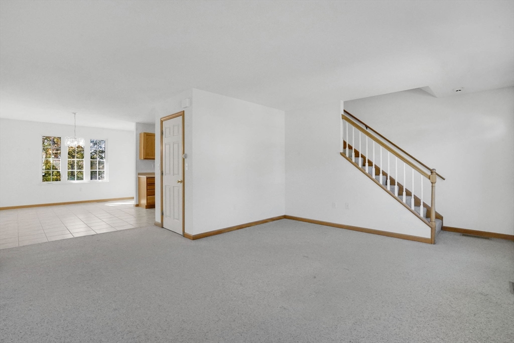 665 Center Street, Unit 705 Ludlow, MA 01056 - Photo 5 of 35 a view of an empty room with a window