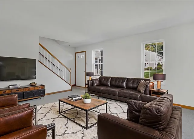 a view of an empty room with windows