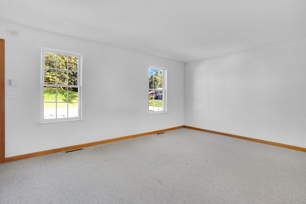 665 Center Street, Unit 705 Ludlow, MA 01056 - Photo 8 of 35 a view of an empty room with a window