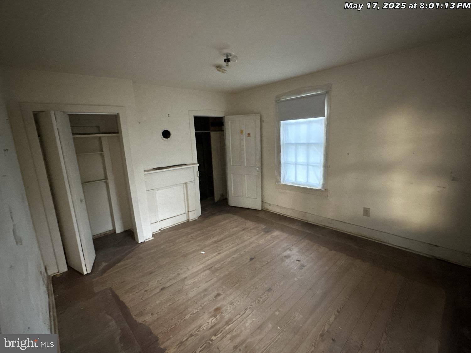 1449 Reliance Road Middletown, VA 22645 - Photo 15 of 23 an empty room with closet and windows