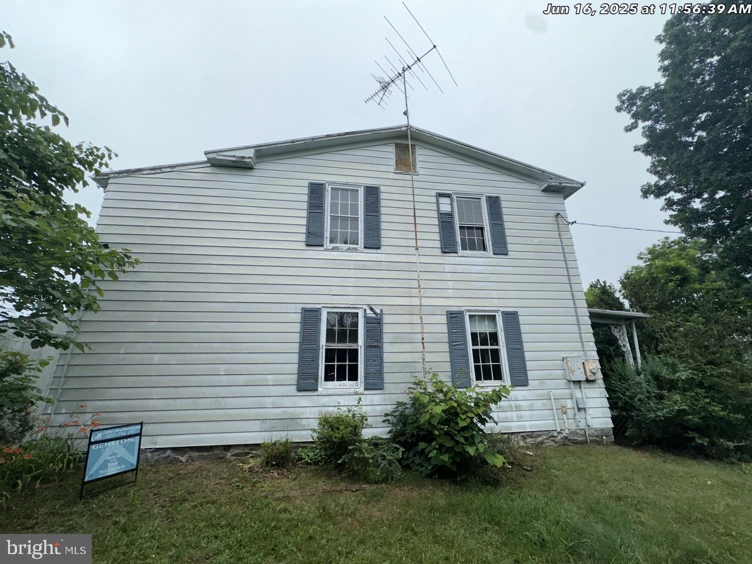1449 Reliance Road Middletown, VA 22645 - Photo 5 of 23 a front view of a house with a yard