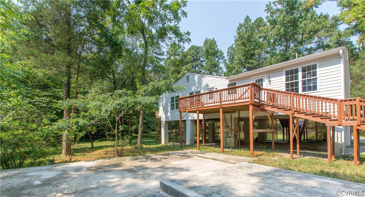 7321 Beach Road Chesterfield, VA 23831 - Photo 3 of 25 a view of a house with a porch and a large tree