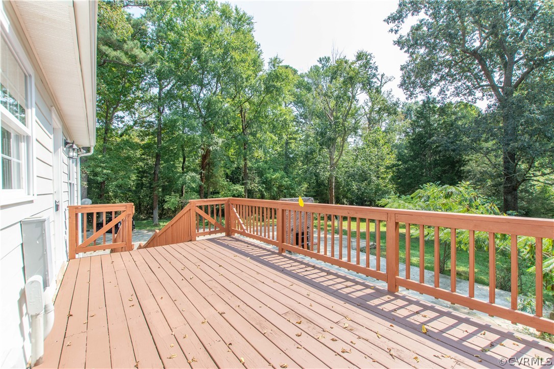 7321 Beach Road Chesterfield, VA 23831 - Photo 5 of 25 a balcony with wooden floor and fence