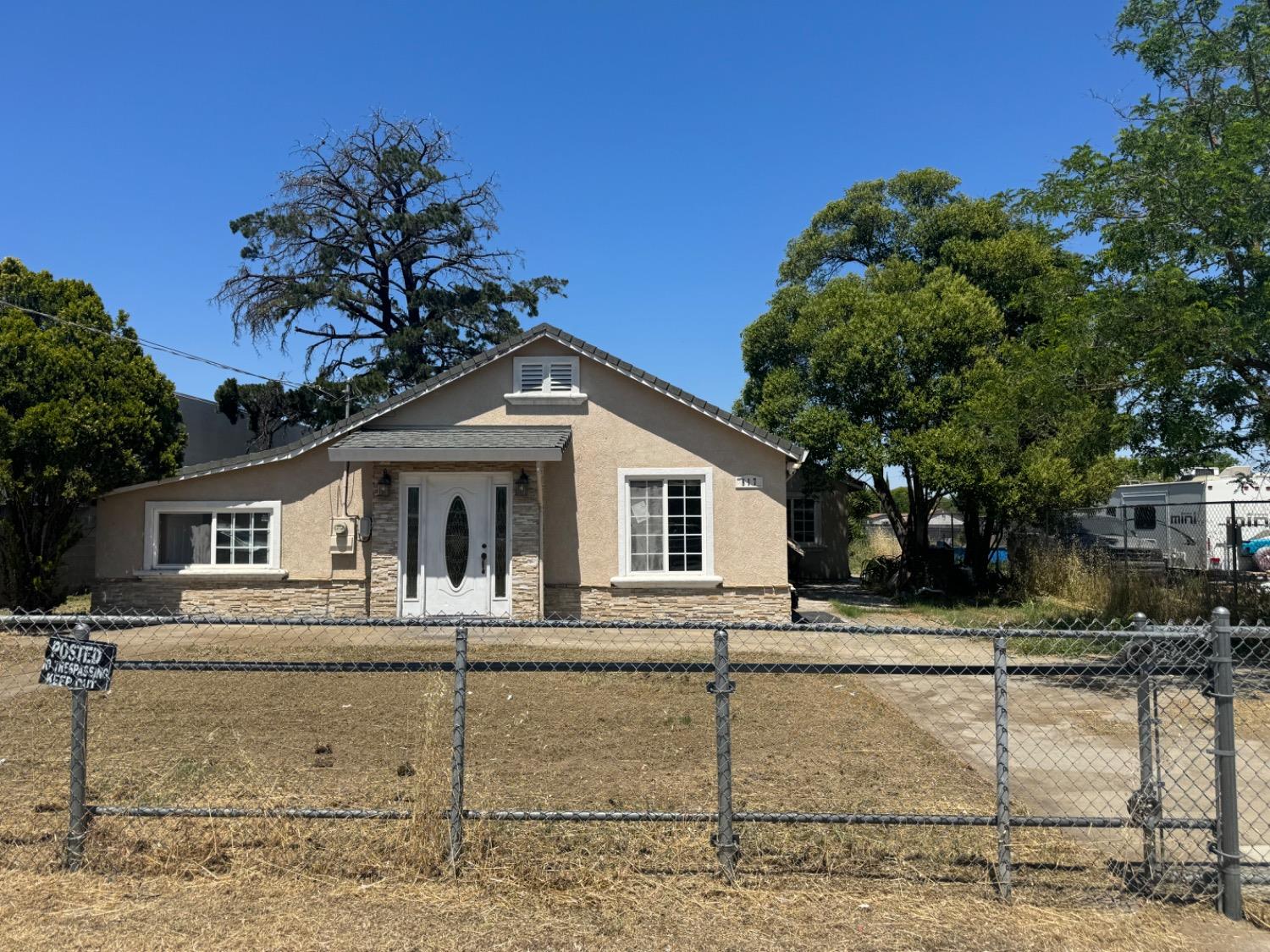 517 Rimmer Avenue Sacramento, CA 95834 - Photo 11 of 20 a white house that has a tree in front of it