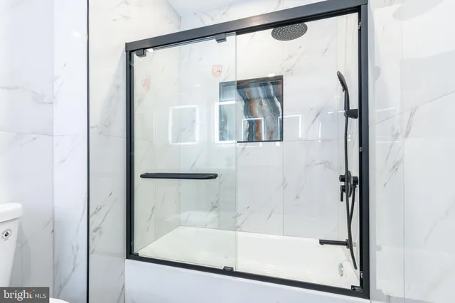 a view of a sink and a mirror