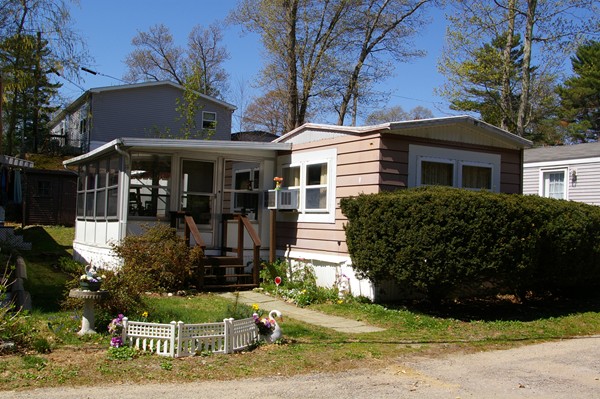 13 Chesapeake Road Holbrook, MA 02343 - Photo 1 of 5 a front view of a house with garden