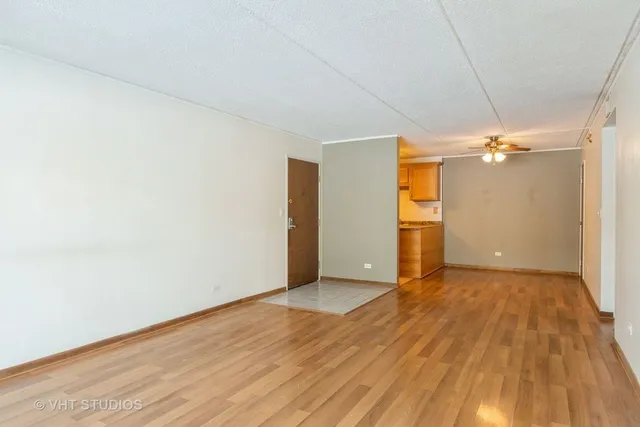 a view of a livingroom with wooden floor