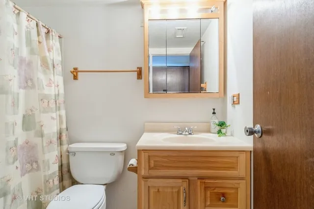 a bathroom with a sink and a toilet