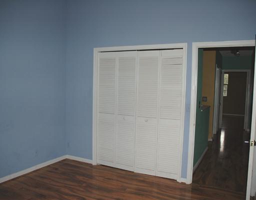 6347 Toulon Drive Boca Raton, FL 33433 - Photo 18 of 24 wooden floor in an empty room